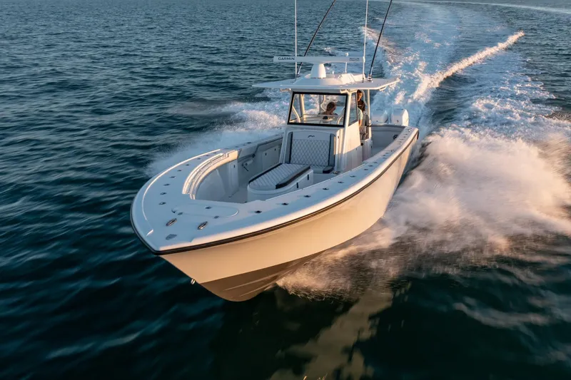  Yacht Photos Pics 2019 Yellowfin 39 boat cruising on open water.