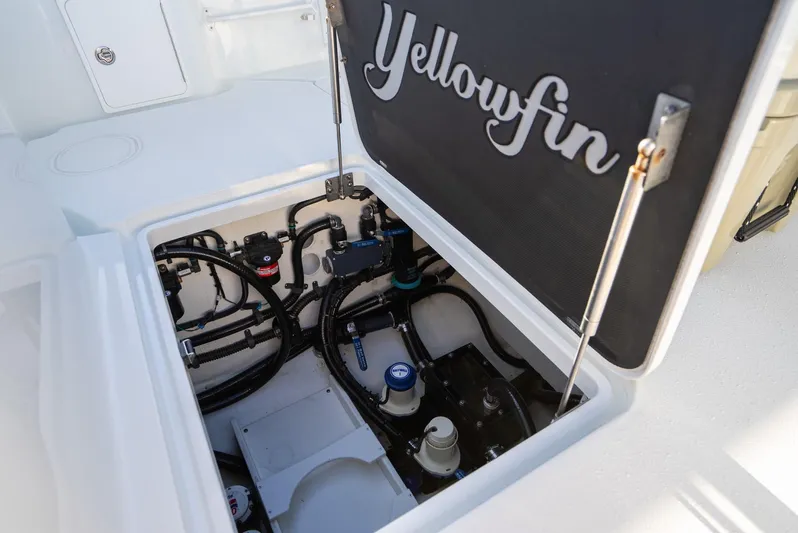  Yacht Photos Pics 2019 Yellowfin 39 boat storage compartment with open hatch.