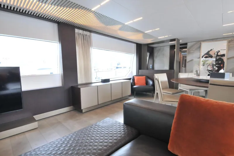  Yacht Photos Pics Luxurious interior of 2017 Ferretti Yachts 850 with modern furnishings and large windows.