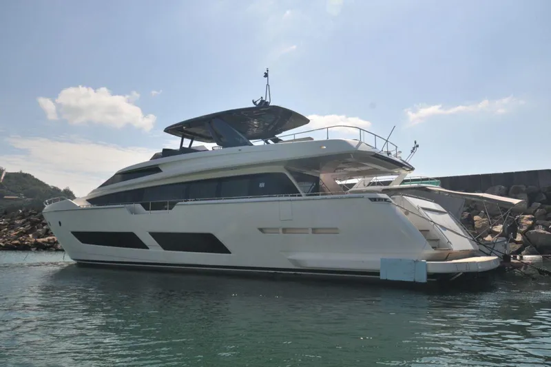  Yacht Photos Pics 2017 Ferretti Yachts 850 luxury yacht docked in a serene harbor.