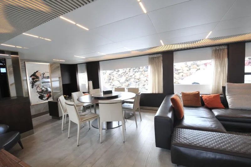  Yacht Photos Pics Luxurious interior of 2017 Ferretti Yachts 850 with modern seating and dining area.