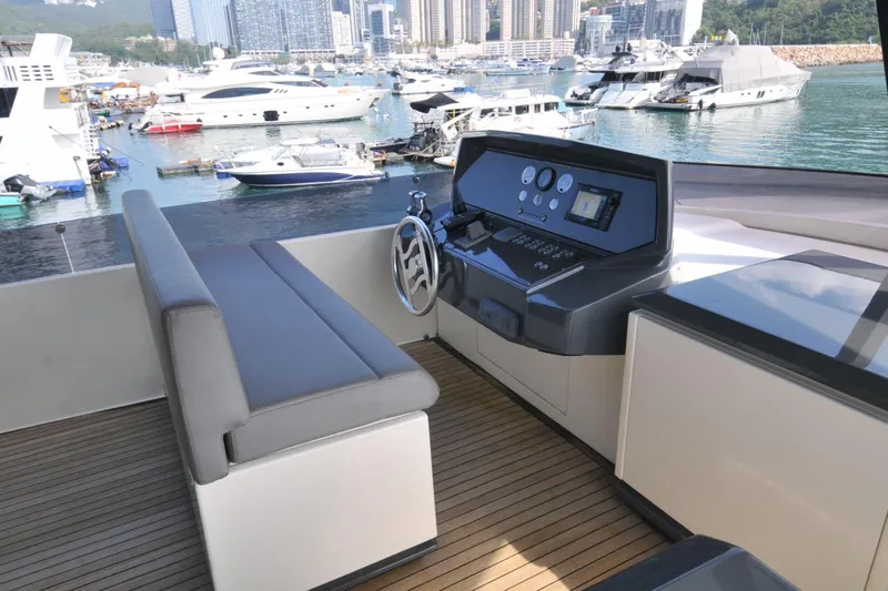  Yacht Photos Pics Luxurious 2017 Ferretti Yachts 850 helm station with marina view.