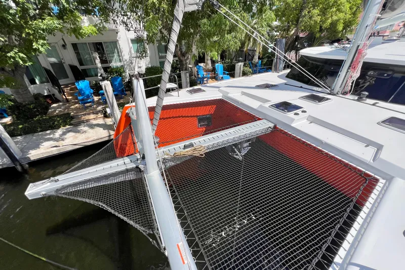Ke'ala Yacht Photos Pics Catamaran Balance 482, 2021 model, docked with visible netting and deck details.