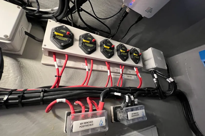 Ke'ala Yacht Photos Pics Electrical panel with labeled switches and cables in a Balance 482, 2021 model.