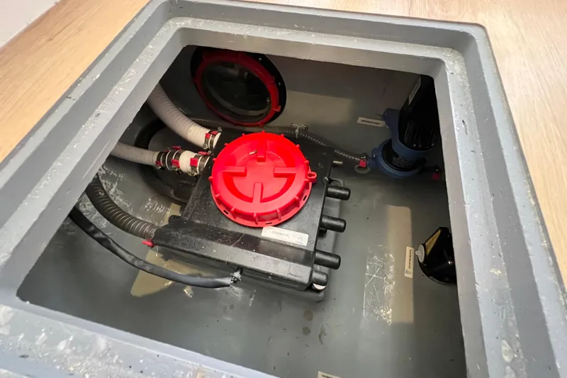 Ke'ala Yacht Photos Pics Compartment with Balance 482 components, featuring red cap and various hoses, 2021 model.