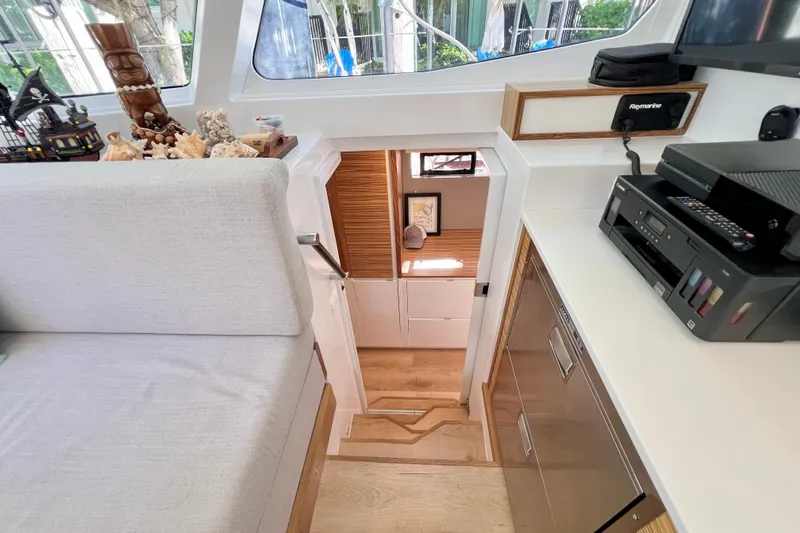 Ke'ala Yacht Photos Pics Interior of 2021 Balance 482 yacht with modern decor and office equipment.