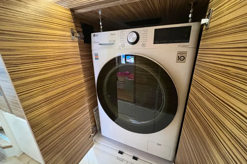 Ke'ala Yacht Photos Pics Front-loading washing machine in a wooden cabinet, Balance model 482, year 2021.