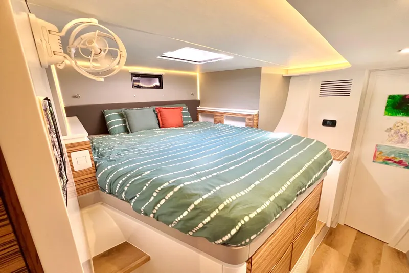 Ke'ala Yacht Photos Pics Luxurious bedroom interior in 2021 Balance 482 yacht with modern design and cozy bedding.
