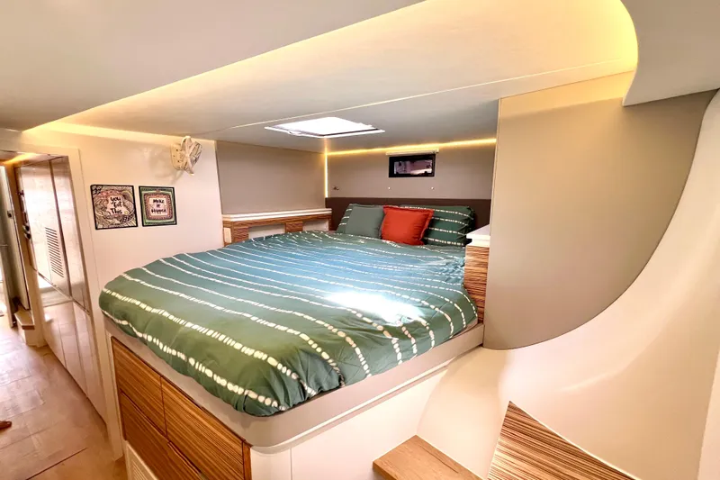 Ke'ala Yacht Photos Pics Luxurious 2021 Balance 482 yacht interior with cozy bed and modern design.