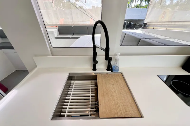 Ke'ala Yacht Photos Pics Modern kitchen sink with black faucet in Balance 482 yacht, 2021 model.