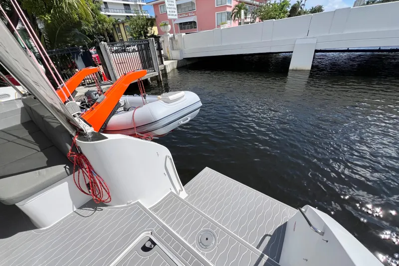 Ke'ala Yacht Photos Pics Catamaran Balance 482, 2021 model, docked with inflatable boat on davits.
