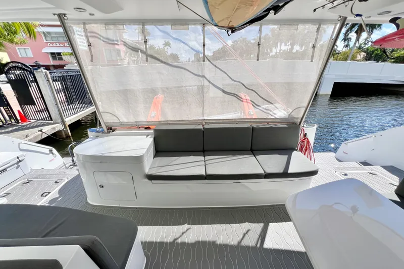 Ke'ala Yacht Photos Pics Luxurious 2021 Balance 482 yacht interior with comfortable seating and waterfront view.
