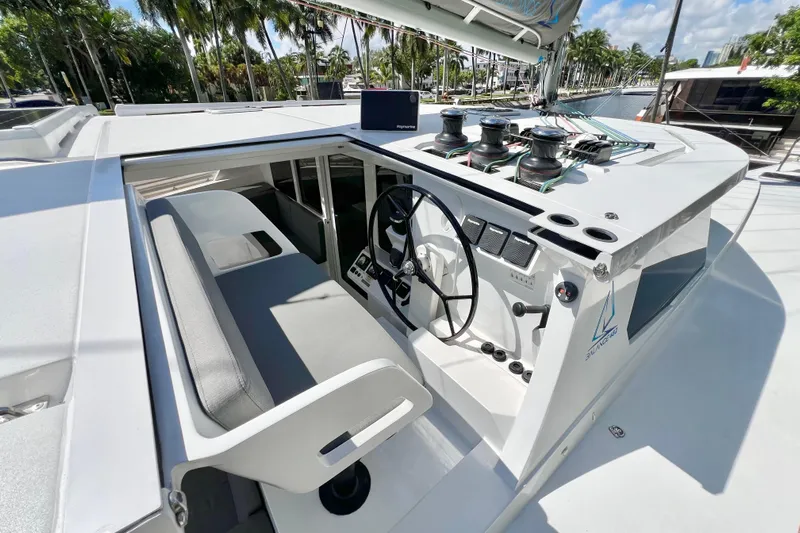 Ke'ala Yacht Photos Pics Helm station of 2021 Balance 482 yacht with modern controls and seating.