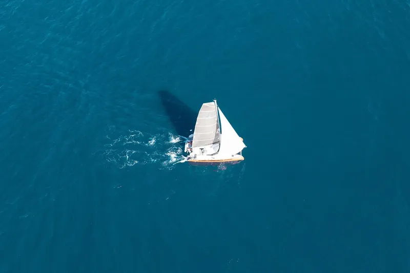 Ke'ala Yacht Photos Pics Aerial view of Balance 482 sailboat navigating clear blue waters, 2021 model.