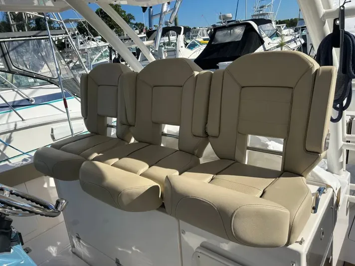 "ahhh Nice" Yacht Photos Pics 2018 Pursuit S 368 Sport boat seats in marina.