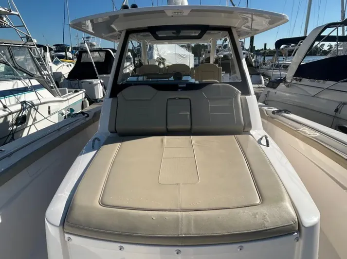 "ahhh Nice" Yacht Photos Pics 2018 Pursuit S 368 Sport boat docked in marina.