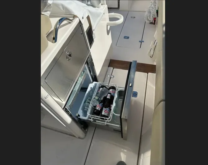 "ahhh Nice" Yacht Photos Pics Refrigerator on Pursuit S 368 Sport boat, stocked with drinks.