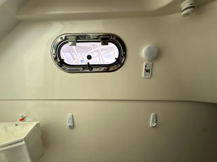 "ahhh Nice" Yacht Photos Pics Interior of Pursuit S 368 Sport boat, window and controls.