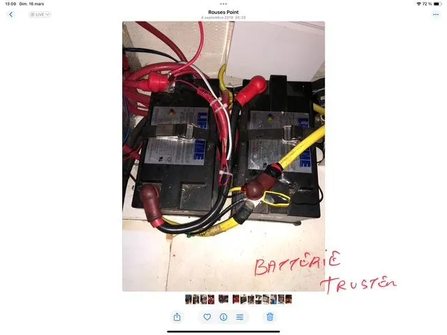 Mano 1 Yacht Photos Pics Batteries with cables on a Mainship 395 Trawler, 2011 model, labeled "Batterie Truster."