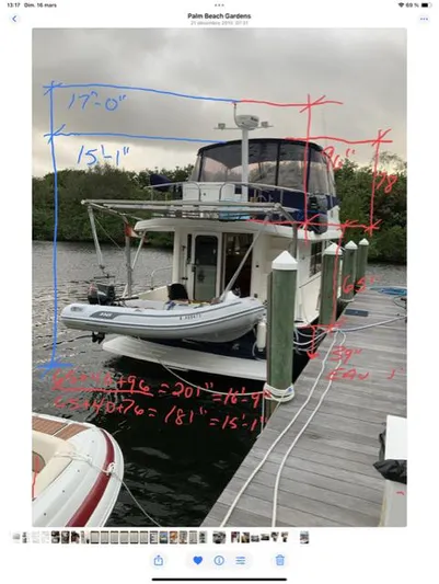Mano 1 Yacht Photos Pics 2011 Mainship 395 Trawler docked, with measurements and notes in red and blue ink.