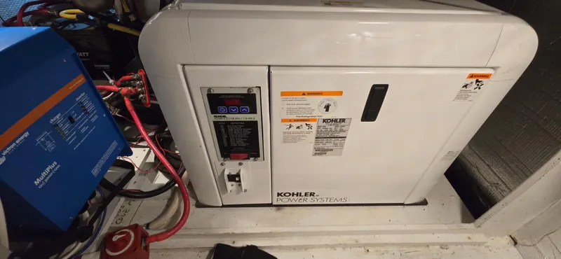 Mano 1 Yacht Photos Pics Kohler power system in 2011 Mainship 395 Trawler engine room.