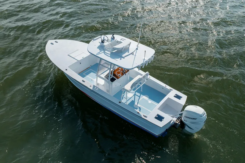 Yacht Photos Pics 2019 Gamefisherman 26 Cuddy Cabin boat on water, aerial view.