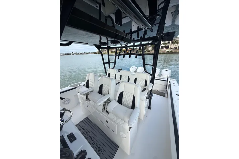  Yacht Photos Pics 2020 SeaHunter 41 CTS boat interior with luxurious seating and sleek design on calm water.