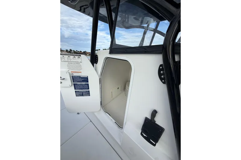  Yacht Photos Pics 2020 SeaHunter 41 CTS boat cabin entrance with open door, showcasing interior space.