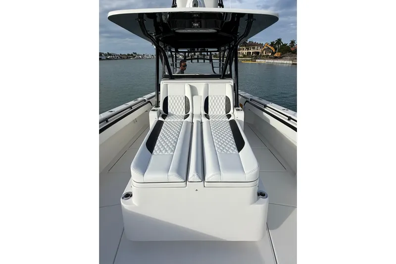  Yacht Photos Pics 2020 SeaHunter 41 CTS boat with luxurious white seating on a calm waterway.