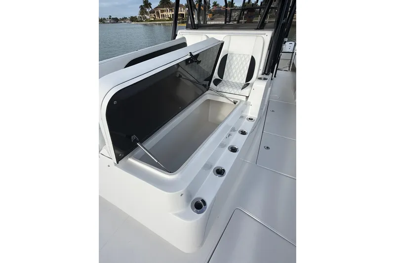  Yacht Photos Pics 2020 SeaHunter 41 CTS boat interior with open storage compartment and seating.