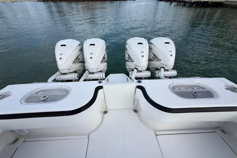  Yacht Photos Pics 2020 SeaHunter 41 CTS boat with four Yamaha V8 engines on calm water.