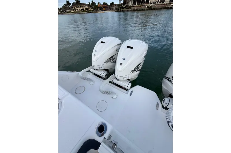  Yacht Photos Pics 2020 SeaHunter 41 CTS boat with twin Yamaha outboard engines on calm water.