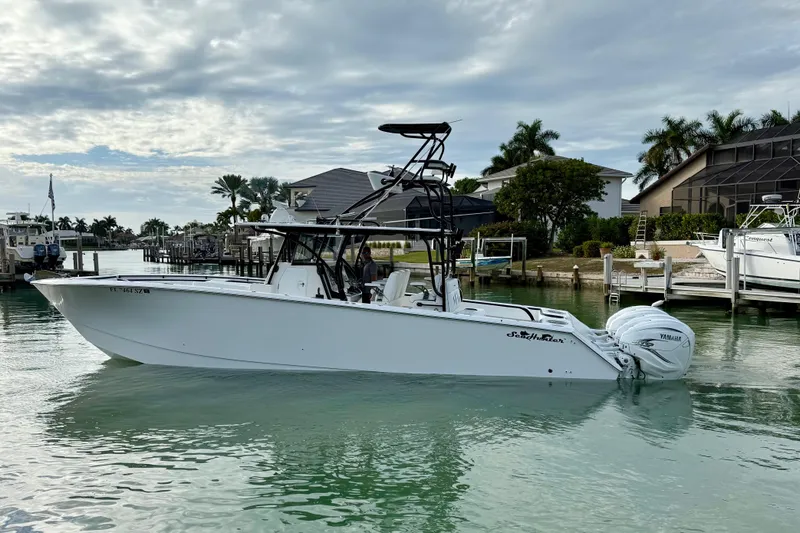  Yacht Photos Pics 2020 SeaHunter 41 CTS boat docked in a serene marina setting.