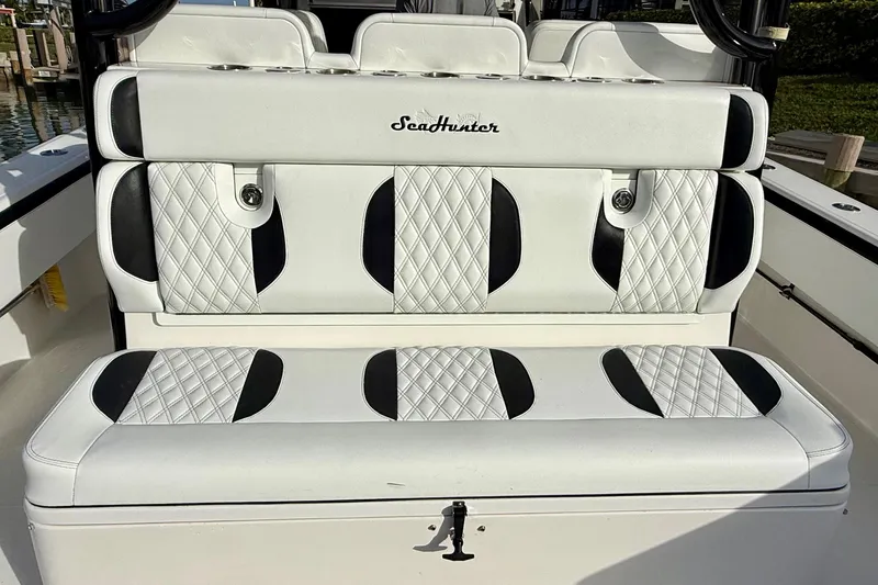  Yacht Photos Pics Luxury seating on 2020 SeaHunter 41 CTS boat with quilted white and black upholstery.