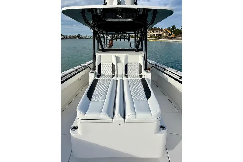  Yacht Photos Pics 2020 SeaHunter 41 CTS boat with luxurious seating on calm waters.