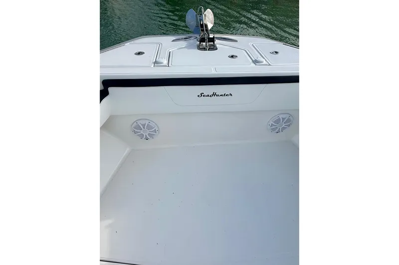  Yacht Photos Pics 2020 SeaHunter 41 CTS boat deck with speakers and anchor, on calm water.