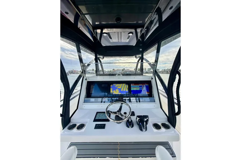  Yacht Photos Pics 2020 SeaHunter 41 CTS boat cockpit with advanced navigation system and steering wheel.