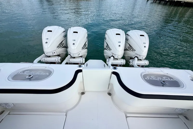  Yacht Photos Pics 2020 SeaHunter 41 CTS boat with four Yamaha V8 engines on calm water.