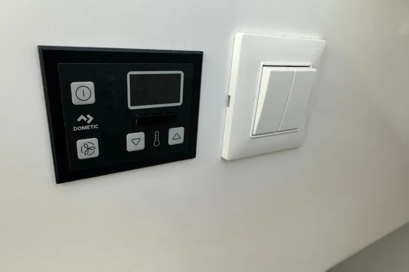  Yacht Photos Pics Dometic control panel and light switch on Southport 33DC, 2020 model.
