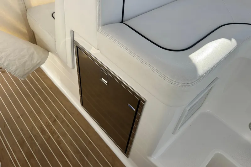  Yacht Photos Pics Luxury seating and storage on 2020 Southport 33DC boat with teak flooring.