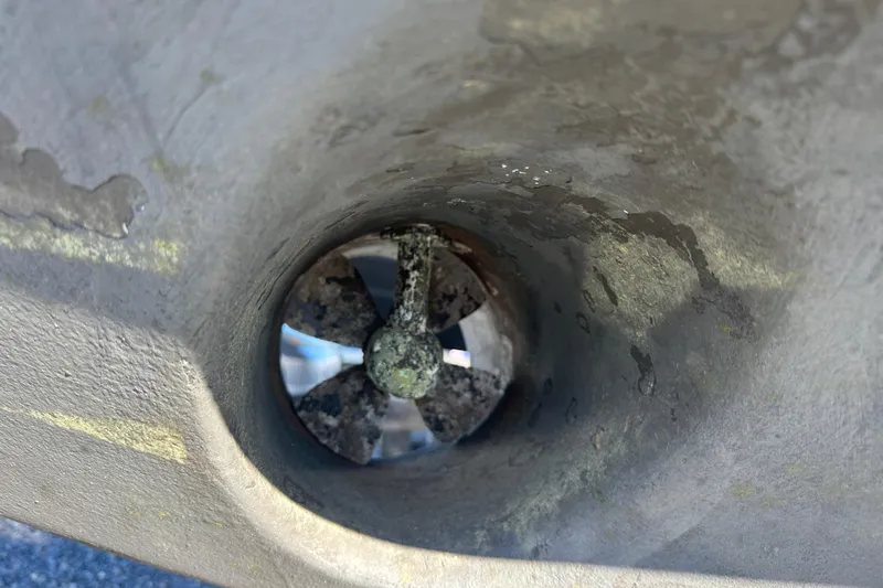  Yacht Photos Pics Close-up of a 2020 Southport 33DC boat thruster with visible wear.