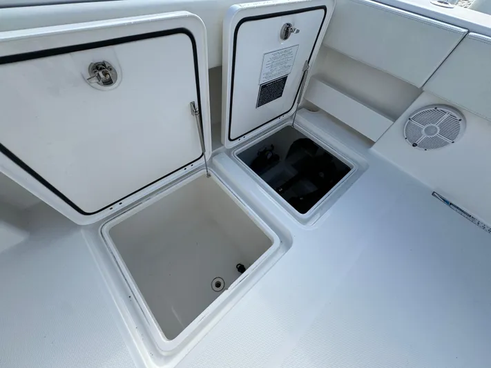  Yacht Photos Pics Open storage compartments on 2022 Invincible 35 Catamaran deck.