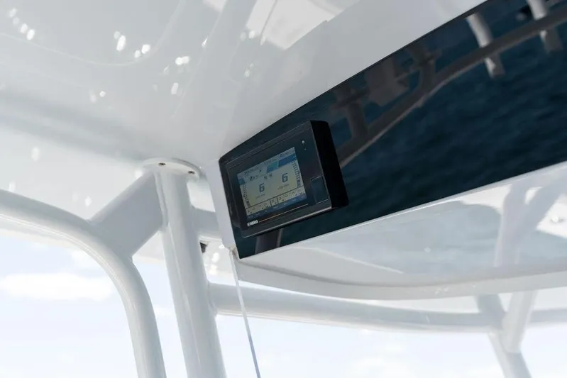  Yacht Photos Pics Digital display on 2022 Jupiter 32 boat console, showing navigation data.