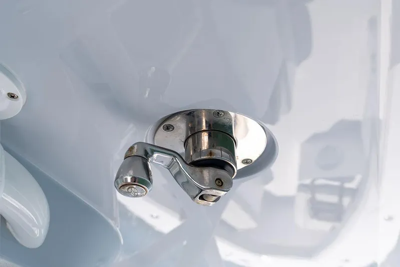  Yacht Photos Pics Chrome boat hardware on a 2022 Jupiter 32, close-up view.
