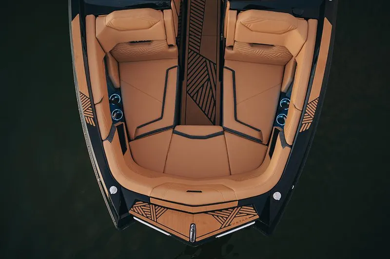  Yacht Photos Pics Manufacturer Provided Image: 2025 MasterCraft XStar 23 boat interior with tan seating and geometric design.