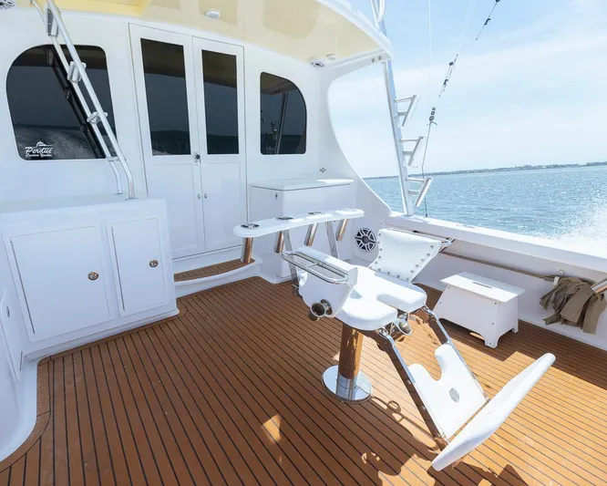  Yacht Photos Pics Luxurious 2013 Custom Express yacht deck with fishing chair and ocean view.