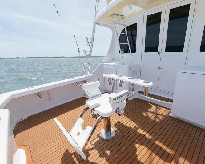  Yacht Photos Pics Luxurious 2013 Custom Express yacht deck with fishing chair and ocean view.