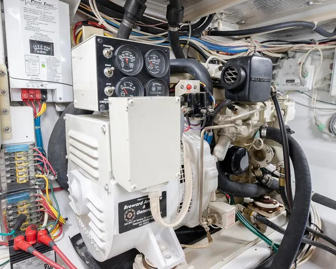  Yacht Photos Pics Engine room with Broward Armature generator, wiring, and control panel, Custom Express 2013 model.