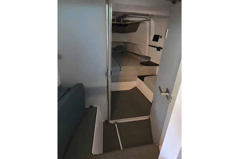 Hell Or High Waters Yacht Photos Pics 2024 Axopar 37XC CROSS CABIN interior with modern seating and sleek design.