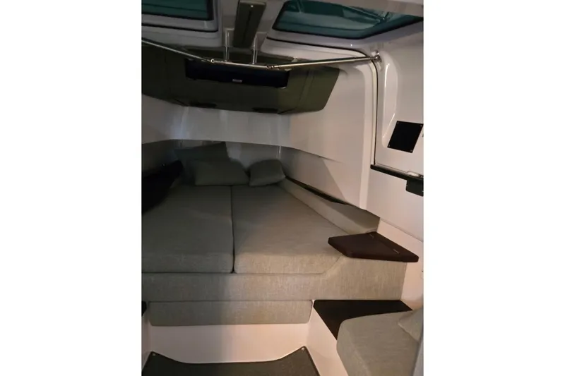 Hell Or High Waters Yacht Photos Pics 2024 Axopar 37XC CROSS CABIN interior with cozy sleeping area and modern design.